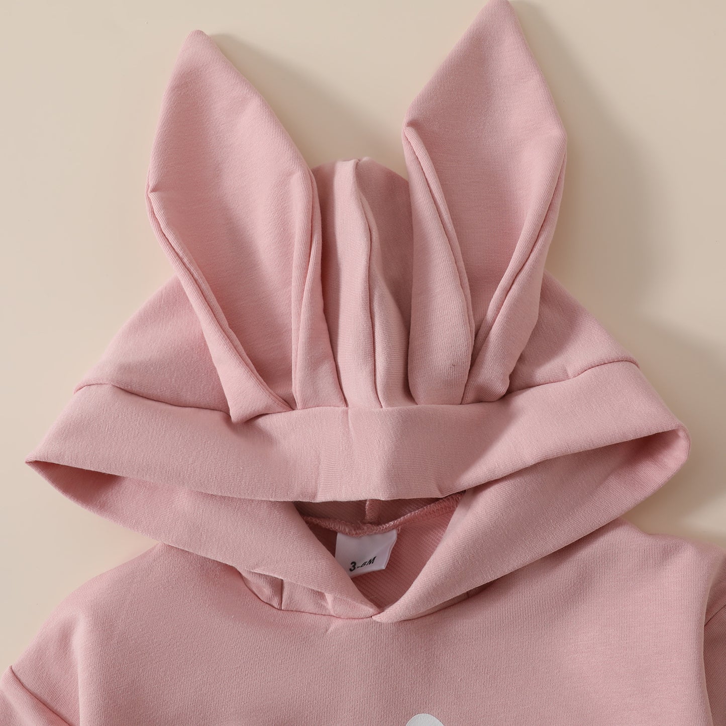 Baby-Spielanzug mit Kapuze und Osterhasen-Print für Mädchen – Langarm-Overall mit Bommelschwanz